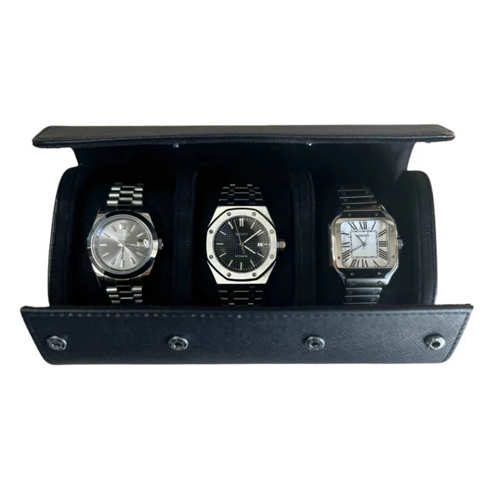 3 Piece - Watch Travel Case (Black). An open black watch roll displays three silver watches with metal bracelets in a studio shot.