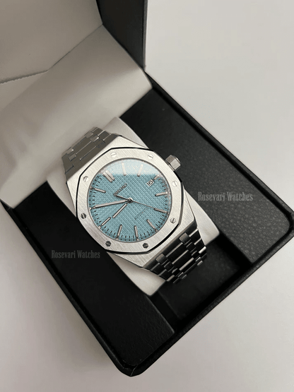 Royal Oak (Light Blue) Seiko NH35 automatic mod watch. A light blue dial watch with a silver bezel and metal bracelet inside a watch box.