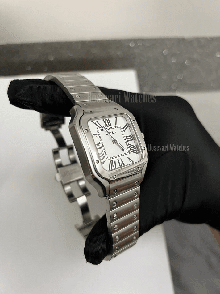 Santos (White) Seiko NH35 automatic mod watch. A white dial watch with a silver bezel and metal link bracelet held in a gloved hand showing the clasp.