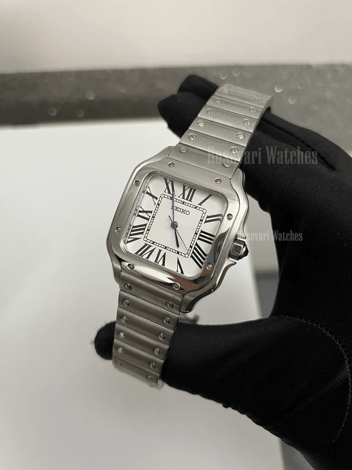 Santos (White) Seiko NH35 automatic mod watch. A white dial watch with a silver bezel and metal link bracelet held in a gloved hand at an angle.