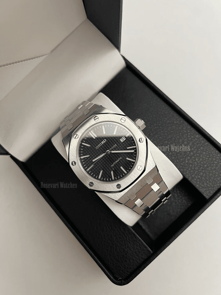 Royal Oak (Black) Seiko NH35 automatic mod watch. A black dial watch with a silver bezel and metal link bracelet inside an open watch box.