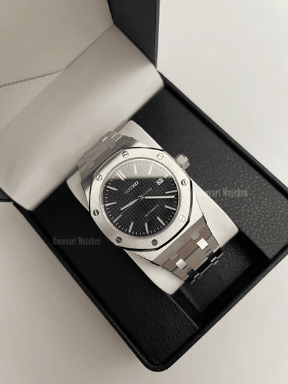 Royal Oak (Black) Seiko NH35 automatic mod watch. A black dial watch with a silver bezel and metal link bracelet inside an open watch box.