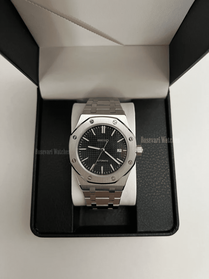 Royal Oak (Black) Seiko NH35 automatic mod watch. A black dial watch with a silver bezel and metal link bracelet inside an open watch box.