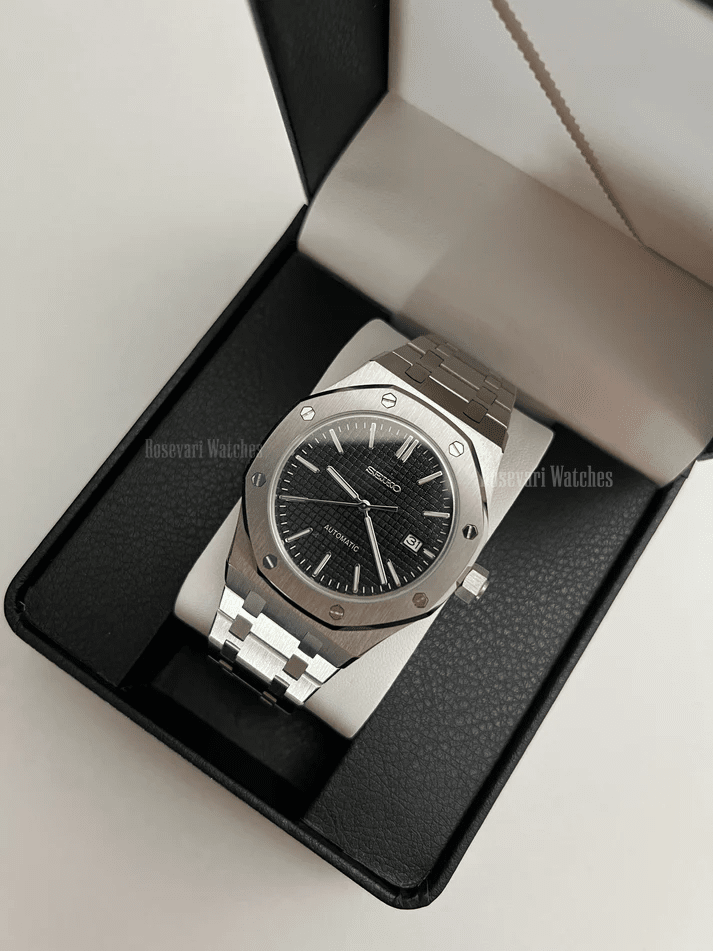 Royal Oak (Black) Seiko NH35 automatic mod watch. A black dial watch with a silver bezel and metal link bracelet inside an open watch box.