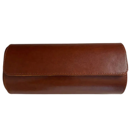 3 Piece - Watch Travel Case (Brown). A closed brown leather watch roll case is shown in a studio shot.