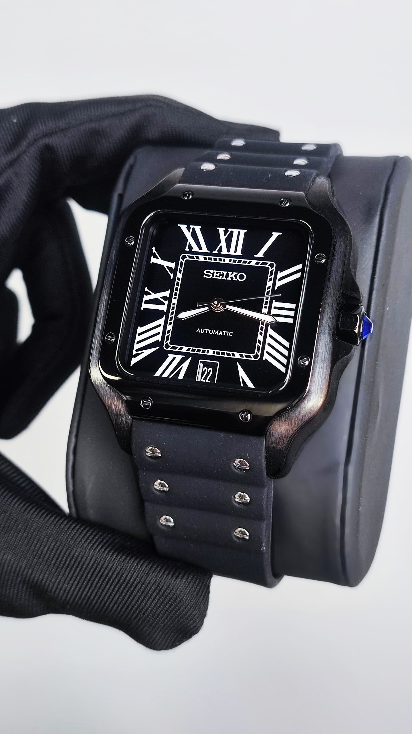 Santos (Black) Seiko NH35 automatic mod watch. A full watch shot showing a black dial with white Roman numerals and a black rubber strap.