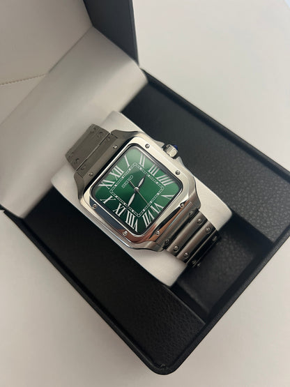 Santos (Emerald Green) Seiko NH35 automatic mod watch. A full watch shot inside a box showing a green dial and silver bezel with a metal bracelet.